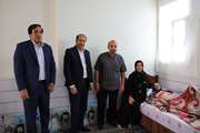 دیدار مدیرکل بنیاد استان مرکزی با جانباز ۷۰ درصد حمید محمدی و  خانواده شهید ایوب قدیری